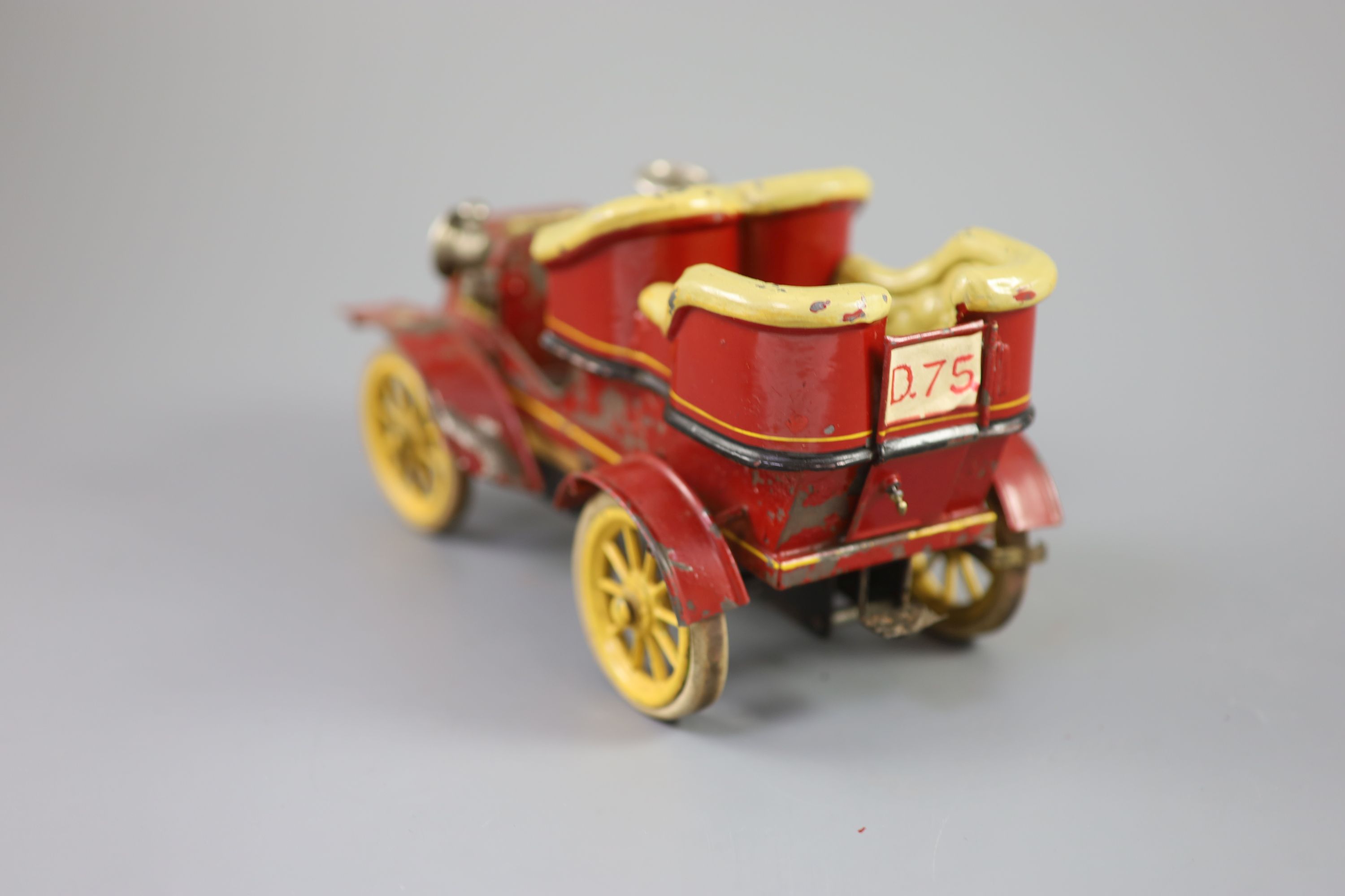 A Bing clockwork tinplate car, c.1906, length 9.5in. width 5in., with original card box and winding key